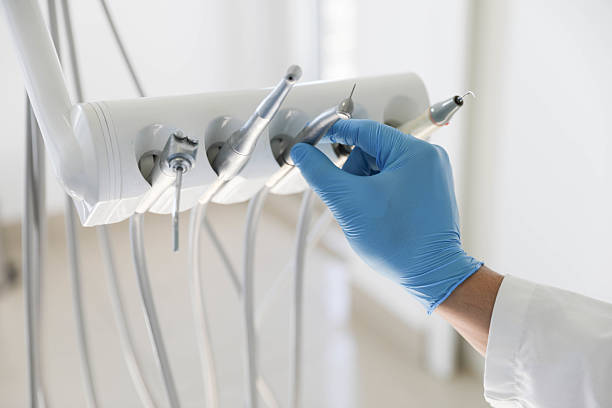 Professional Tooth Extraction technician working in Canton, GA